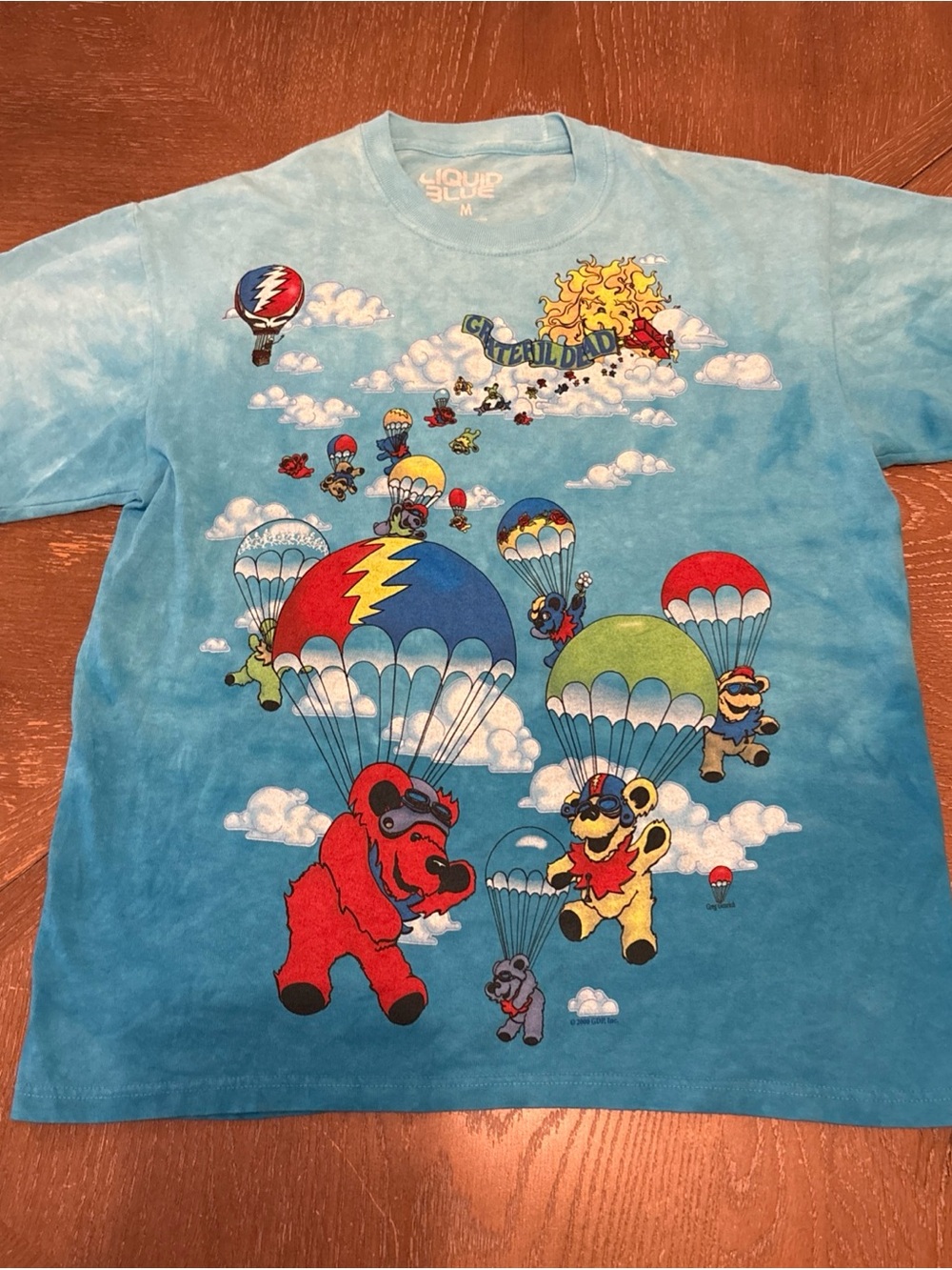 Grateful Dead Liquid Blue Woman’s Parachute Bear Graphic Tee